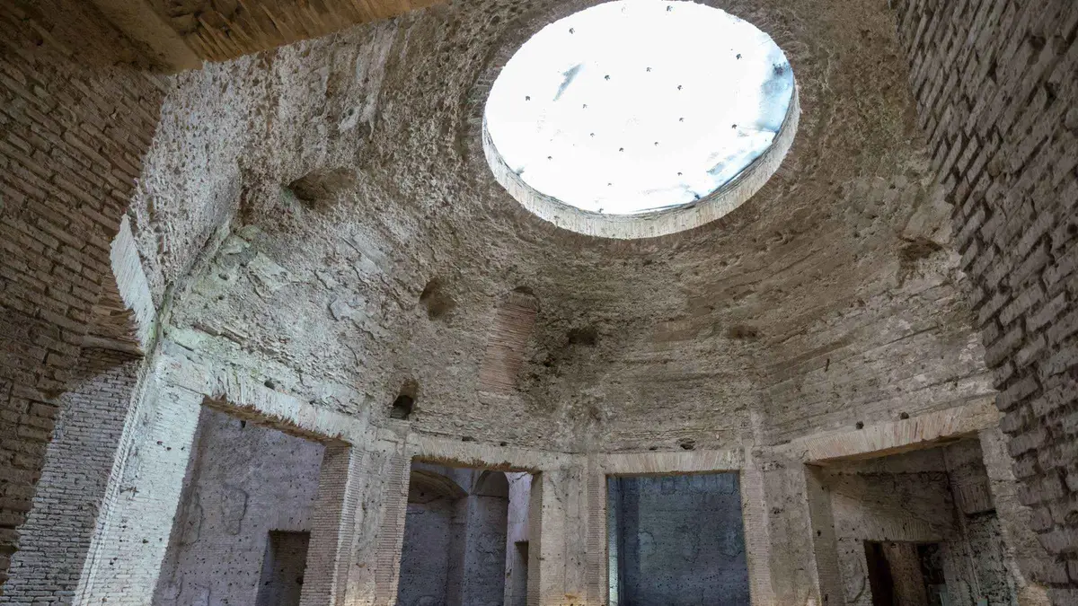 Excavated frescoed corridor inside Nero's Golden House on a Rome underground tour